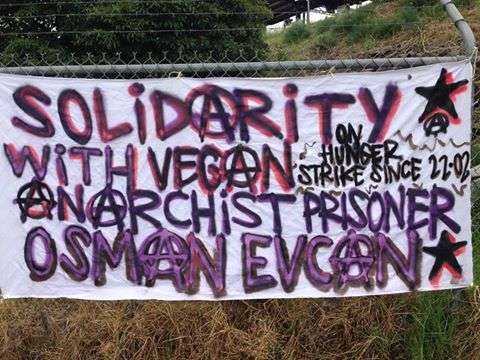 Melbourne, Australia: Banner in solidarity with vegan anarchist prisoner Osman Evcan