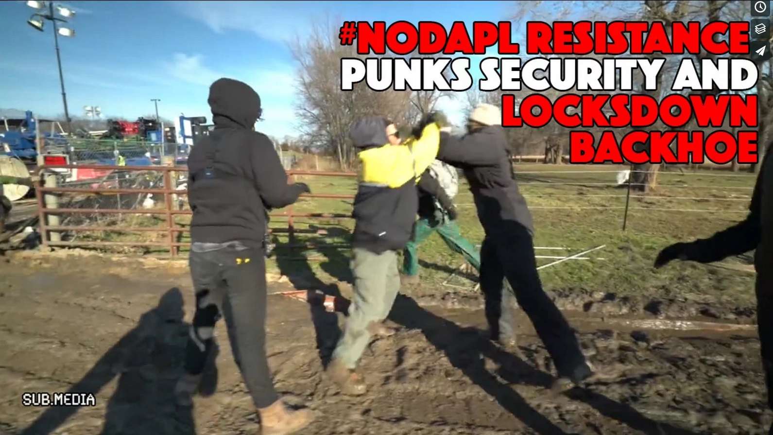 USA: #NODAPL resistance punks security and locks down to backhoe