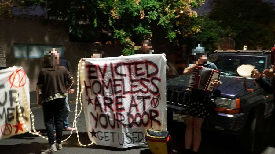 Melbourne, Australia: Anarchists and homeless people protest outside the home of Lord Mayor Robert Doyle